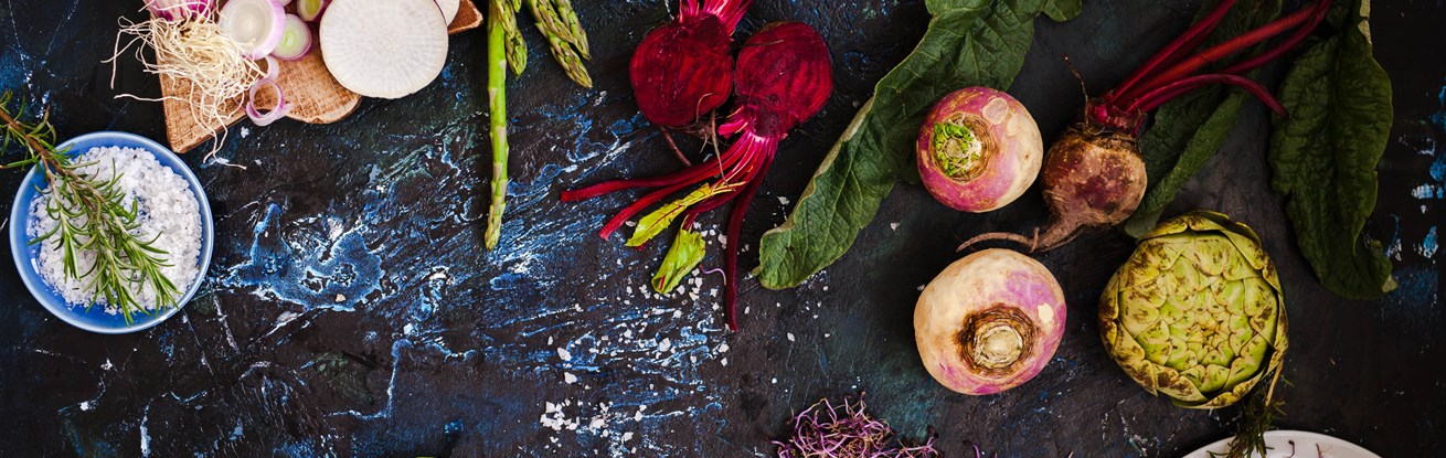 Fruits and vegetables on rustic background.jpg