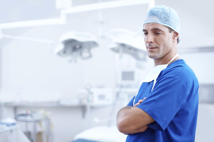 medical professional in a surgery room