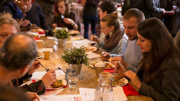 people enjoying a dinner at a restaurant