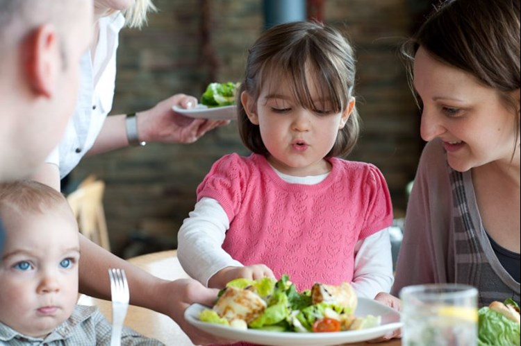 child looking at food