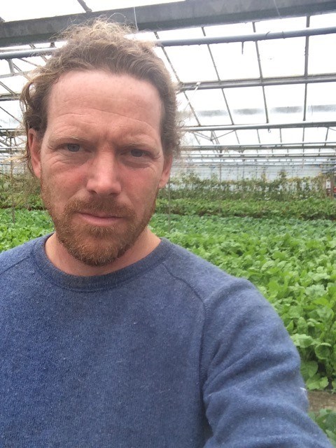 Pete Dollimore in his glasshouse