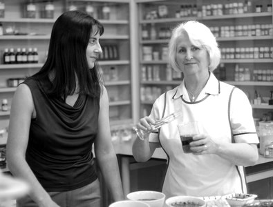 Black and white photo of Abi and Margaret, founders of Odylique