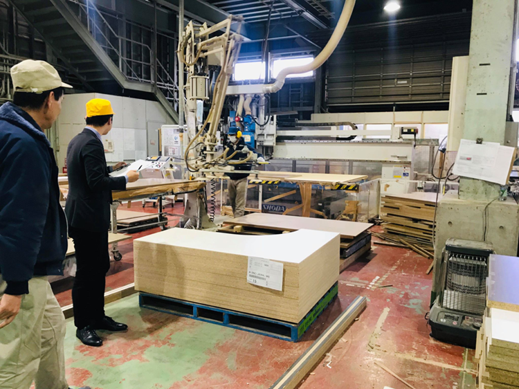 A witnessed audit is taking place at a factory