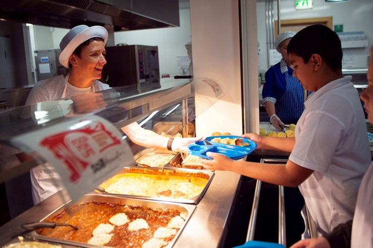 Mairi Gougeon serving school meals