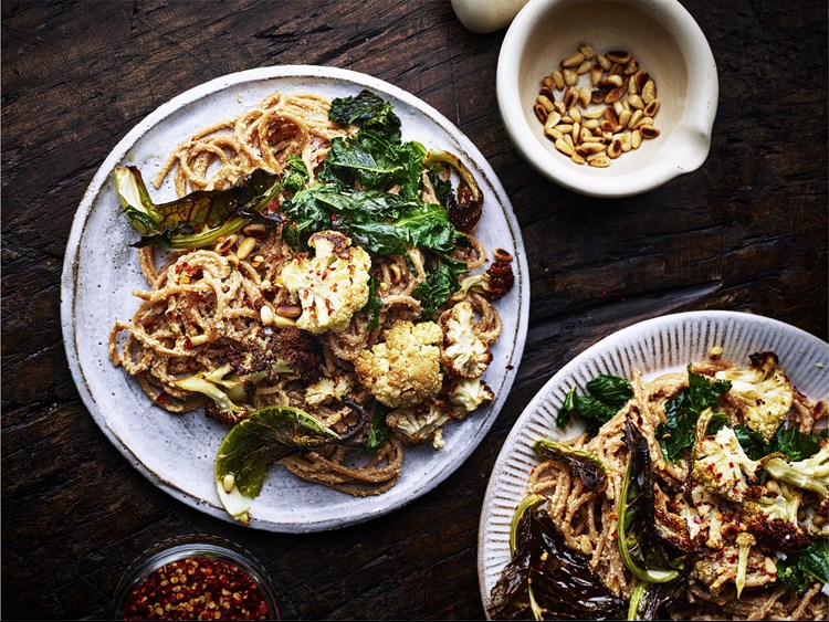 Niki Webster's cauliflower carbonara, served on a plat with pine nuts