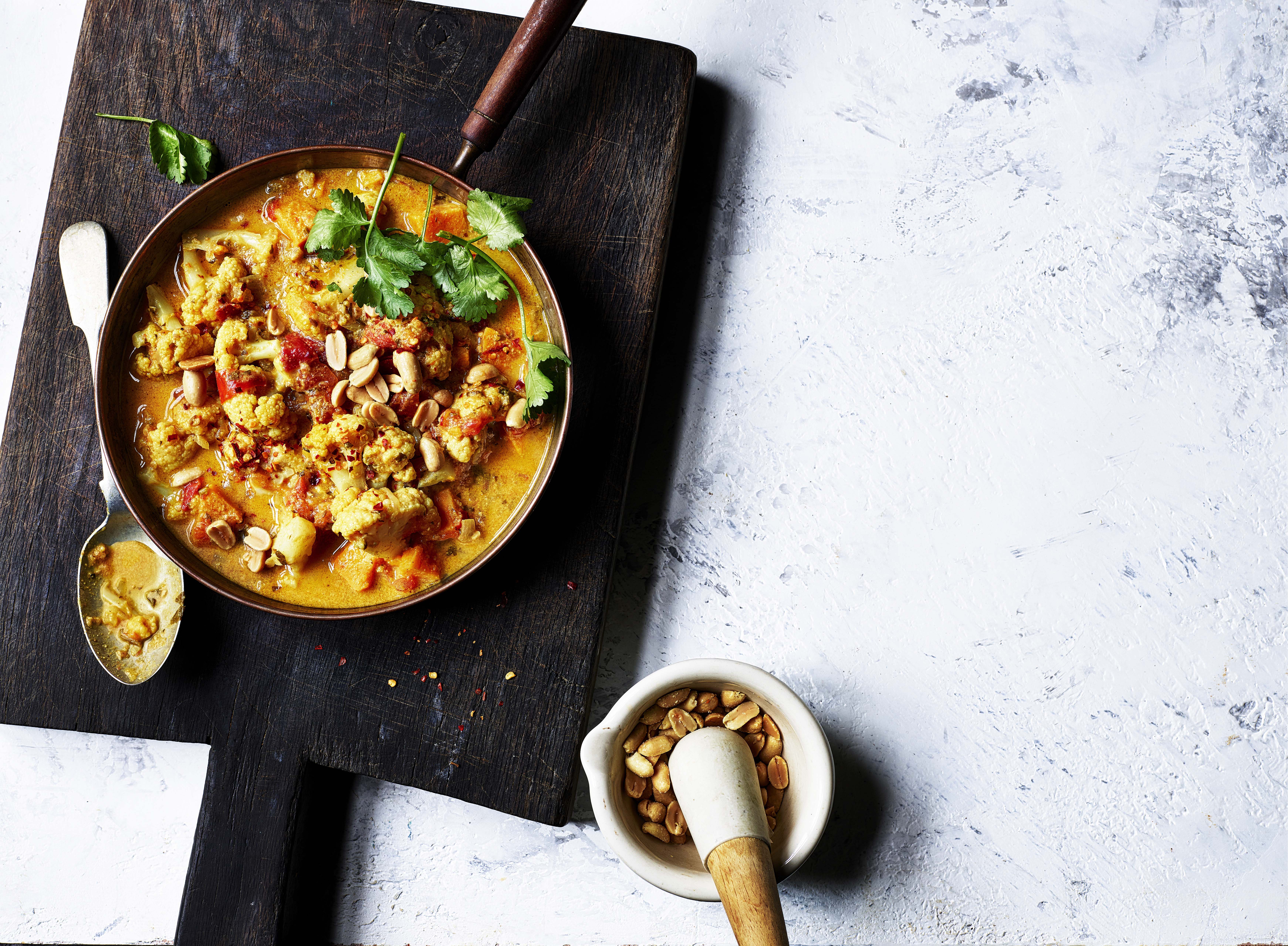 Sweet potato, peanut and cauliflower stew