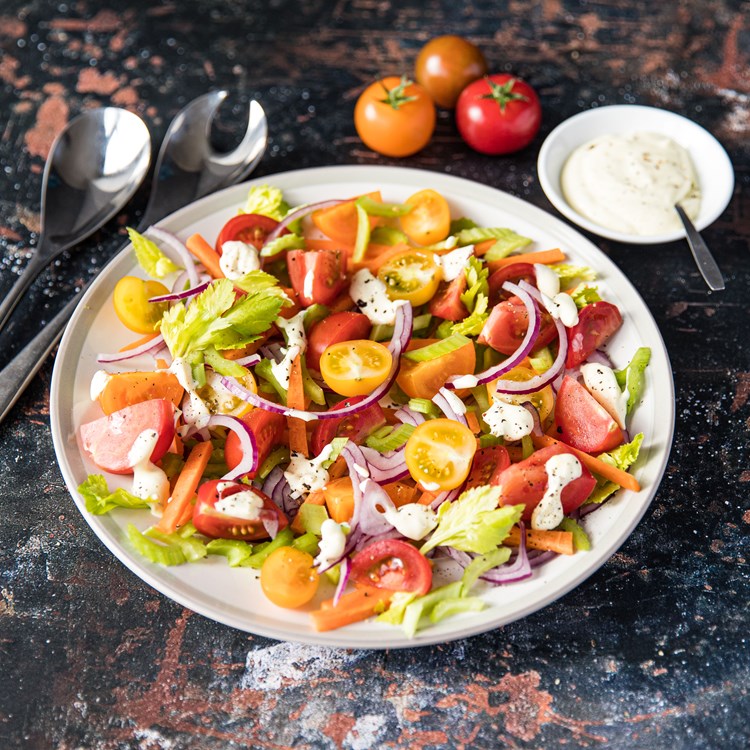isle of wight tomato salad served on a plate