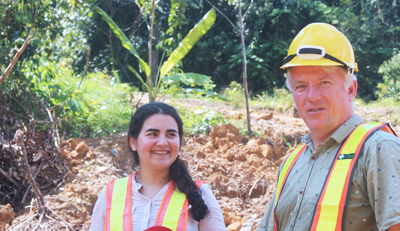 Smiling colleagues in PPE
