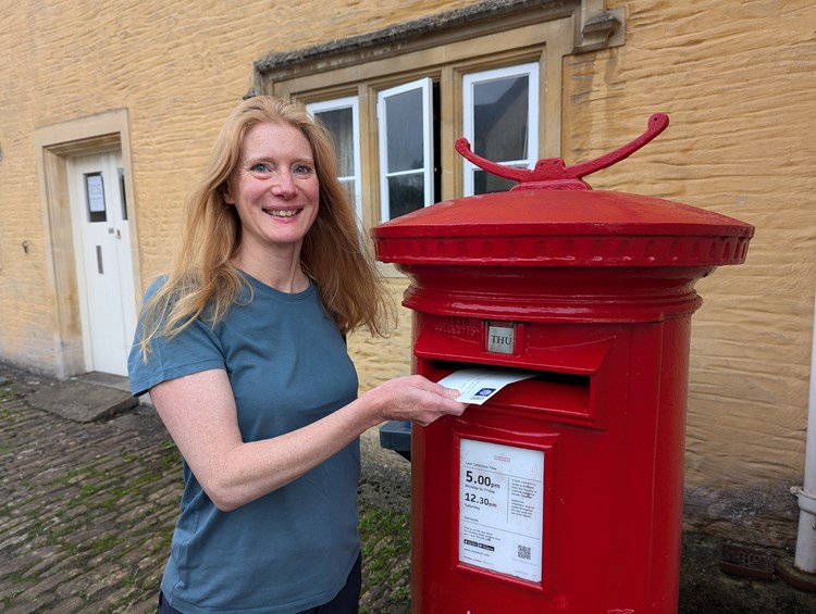 Cathy Cliff, Policy Advisor posting our Whole Truth letter to Wes Secretary