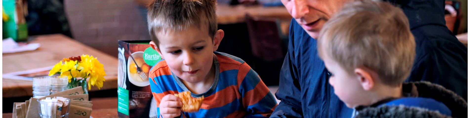 family eating food restaurant.jpg