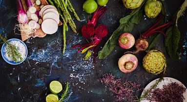 Fruits and vegetables on rustic background.jpg