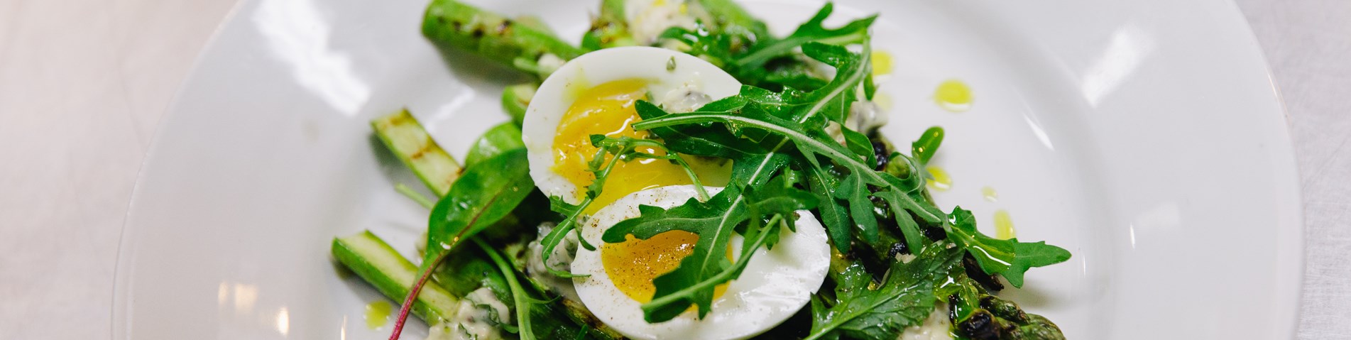 Organic asaparagus and egg on plate Cafe St Honore Organic Served HEre award holder 2- Credit Andrew Perry.jpg