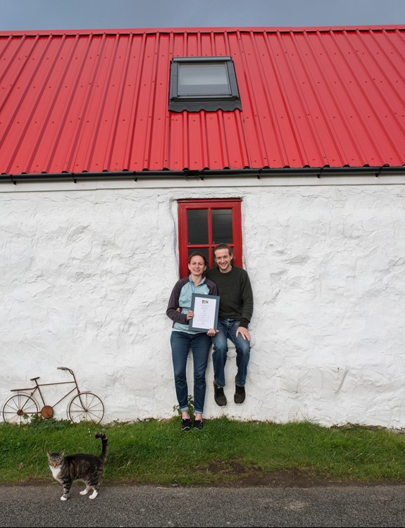 red roof owners with award