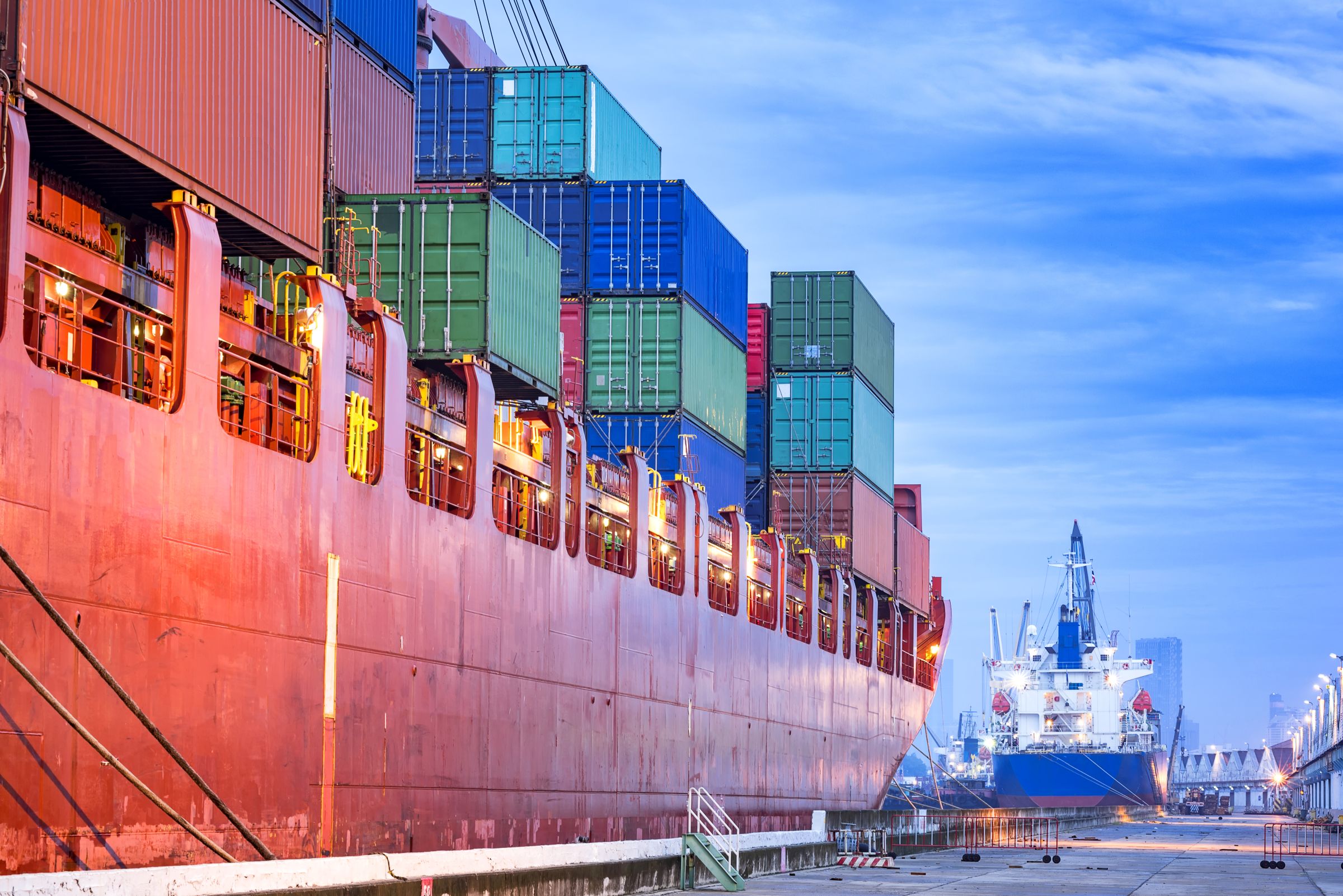 Shipping containers and ships