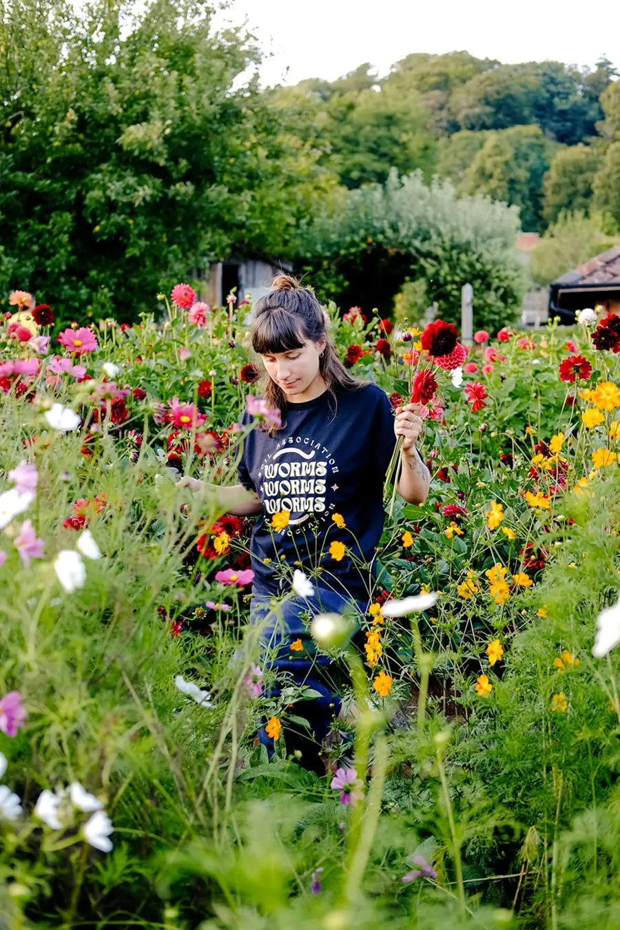 woman_in_soil_association_t-shirt_in_plants