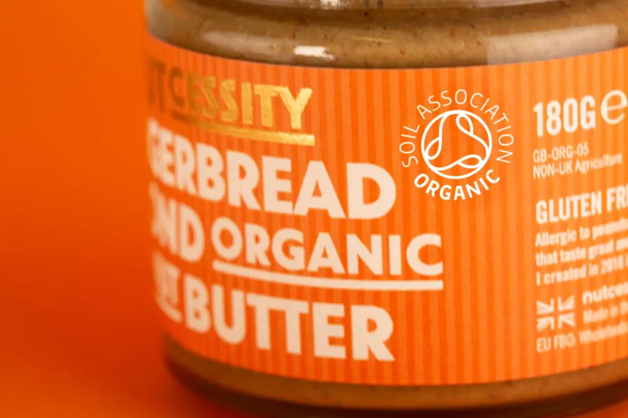 The Soil Association organic logo on a jar of Nutcessity peanut butter