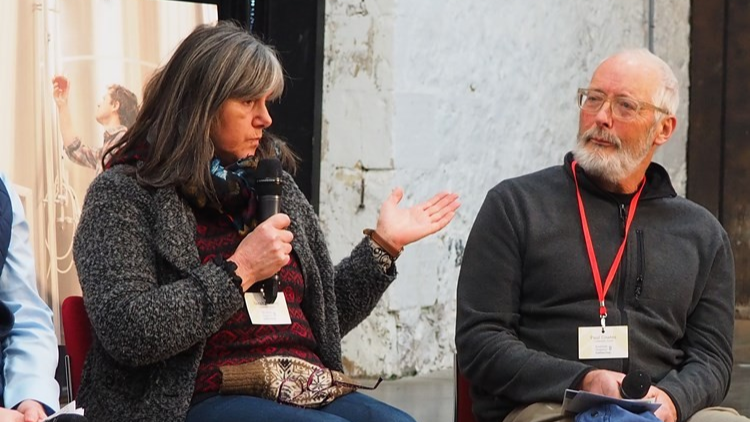 Sarah Morbey speaking into a microphone.