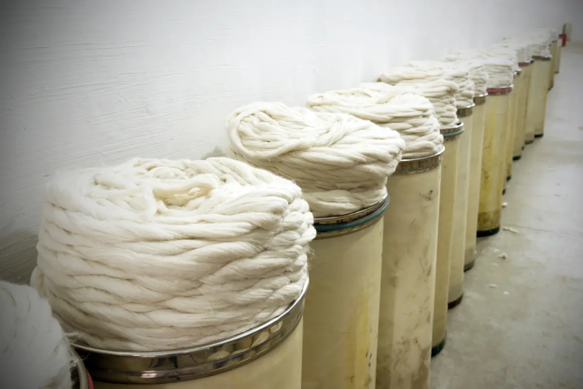 Barrels of coiled fabric