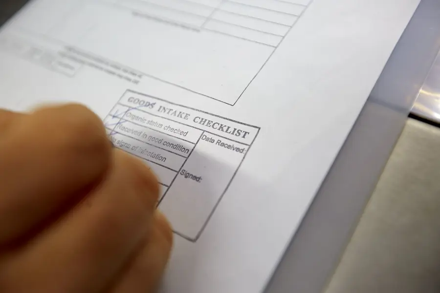 Person completing inspection paperwork