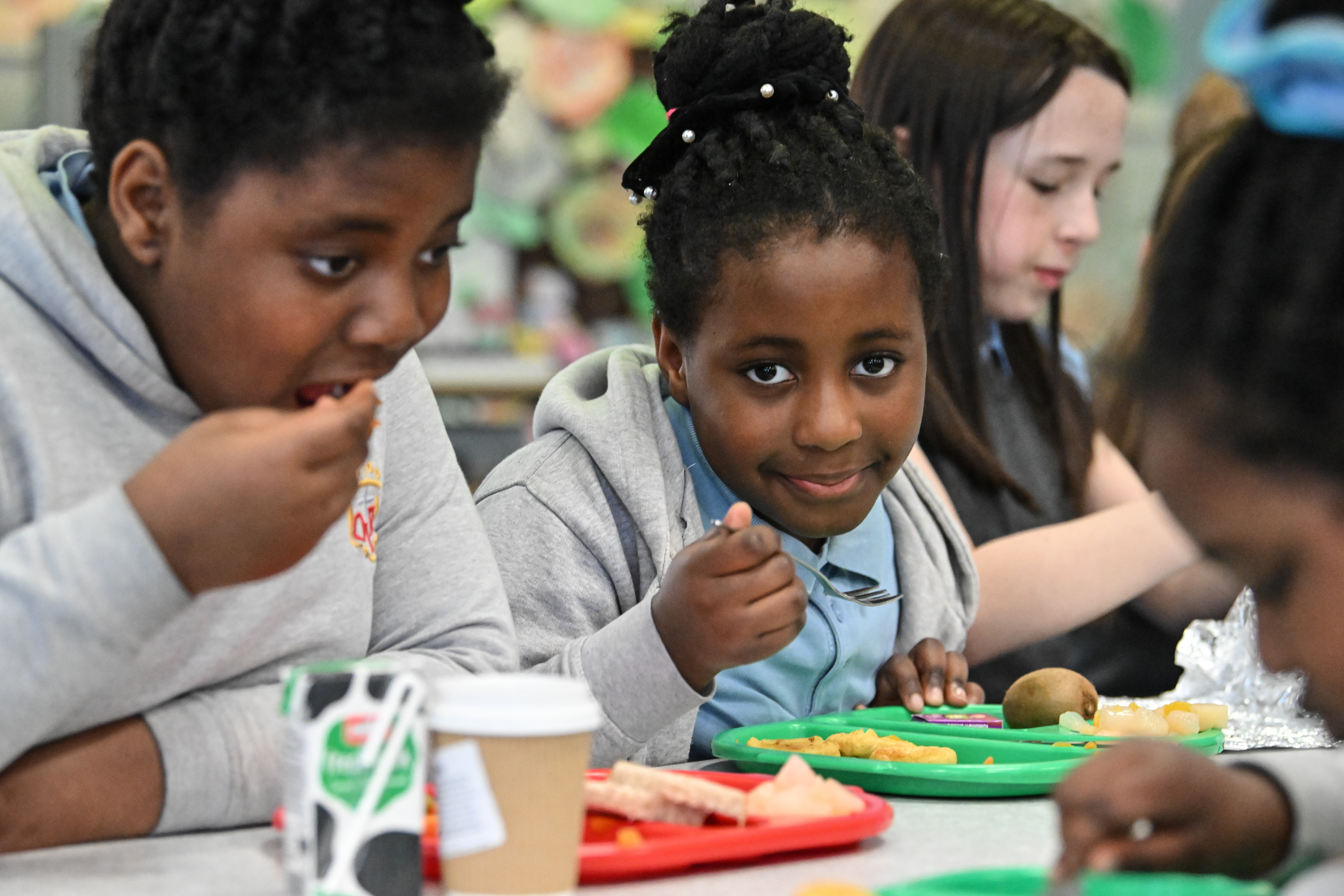 School pupils eating their school meal