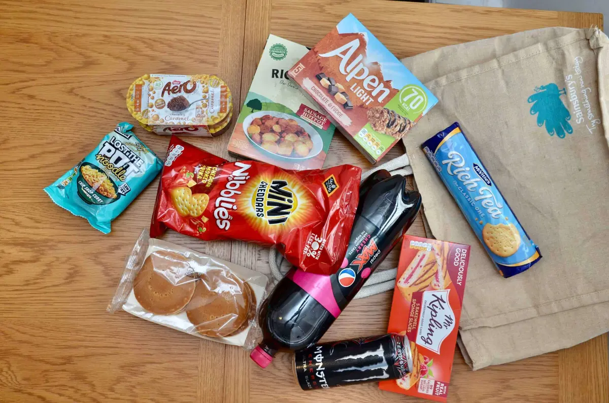 A selection of packaged ultra-processed foods and carbonated drinks