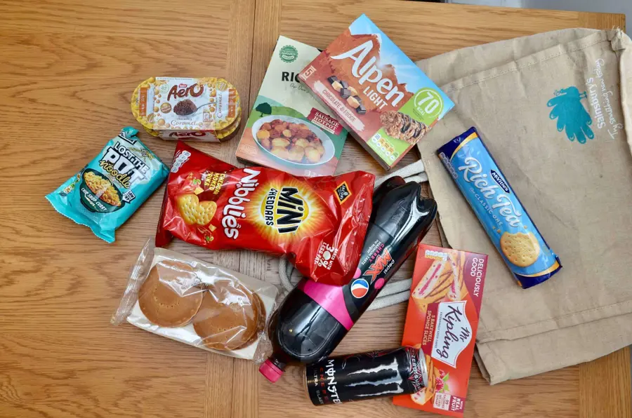 A selection of packaged ultra-processed foods and carbonated drinks