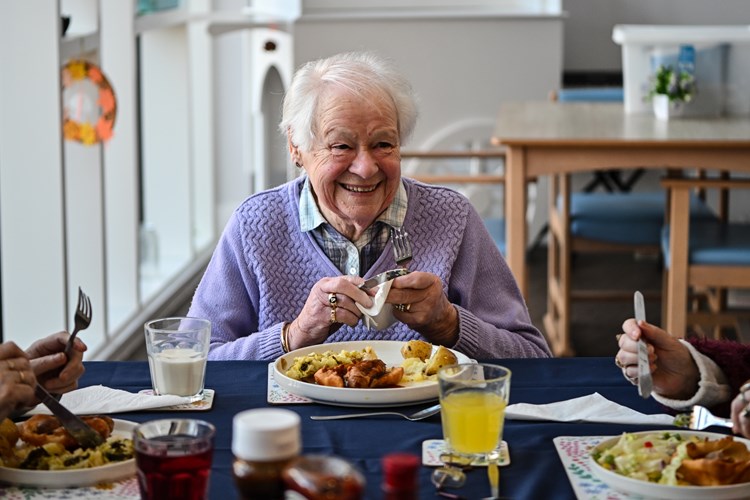 A person eating a meal